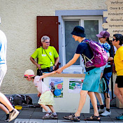 Infostand und Besuchende